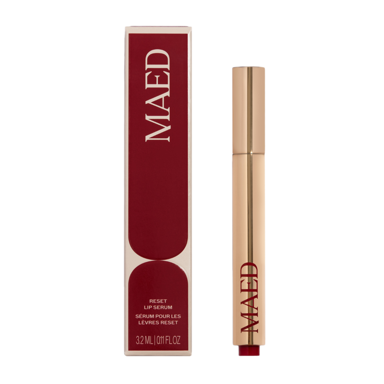 reset lip serum gold applicator tube with red box packaging next to it.